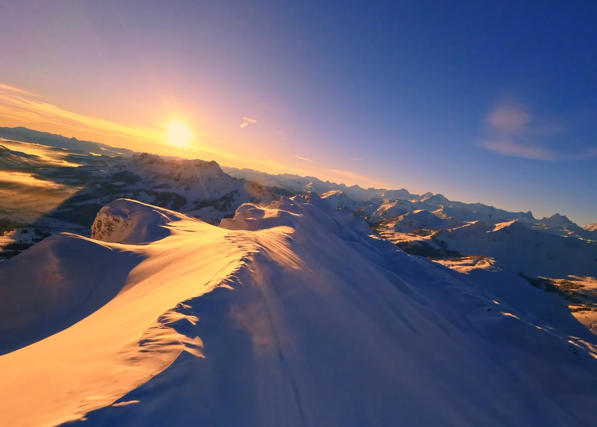 Snowy mountain landscape at sunset, shot on Droneer X701 FPV drone